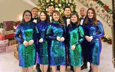 Blue christmas carol singers