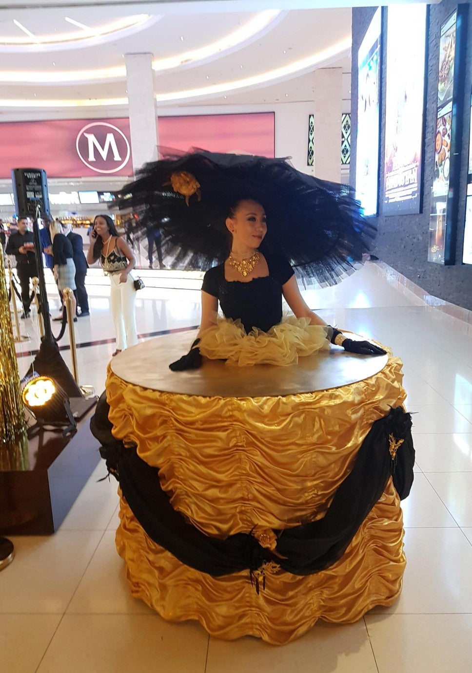 Back and Golden Strolling Table Ladies