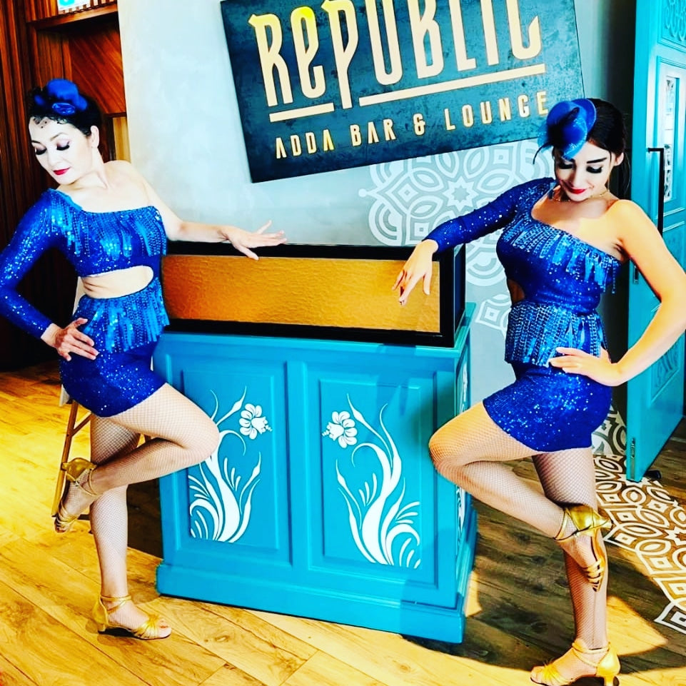 Blue Samba dancers and hostess by Fidelio Arts