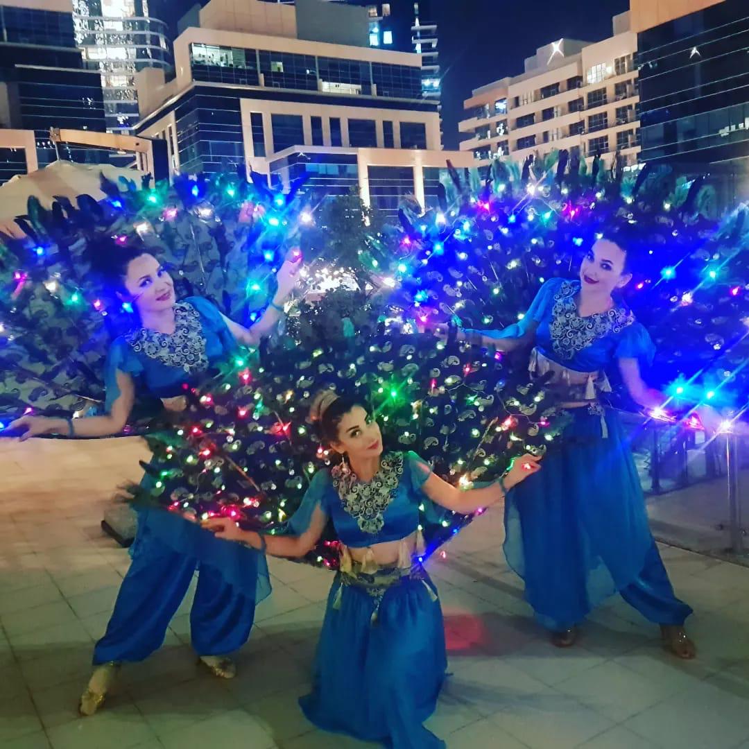 Blue peacock LED dancers by Fidelio Arts