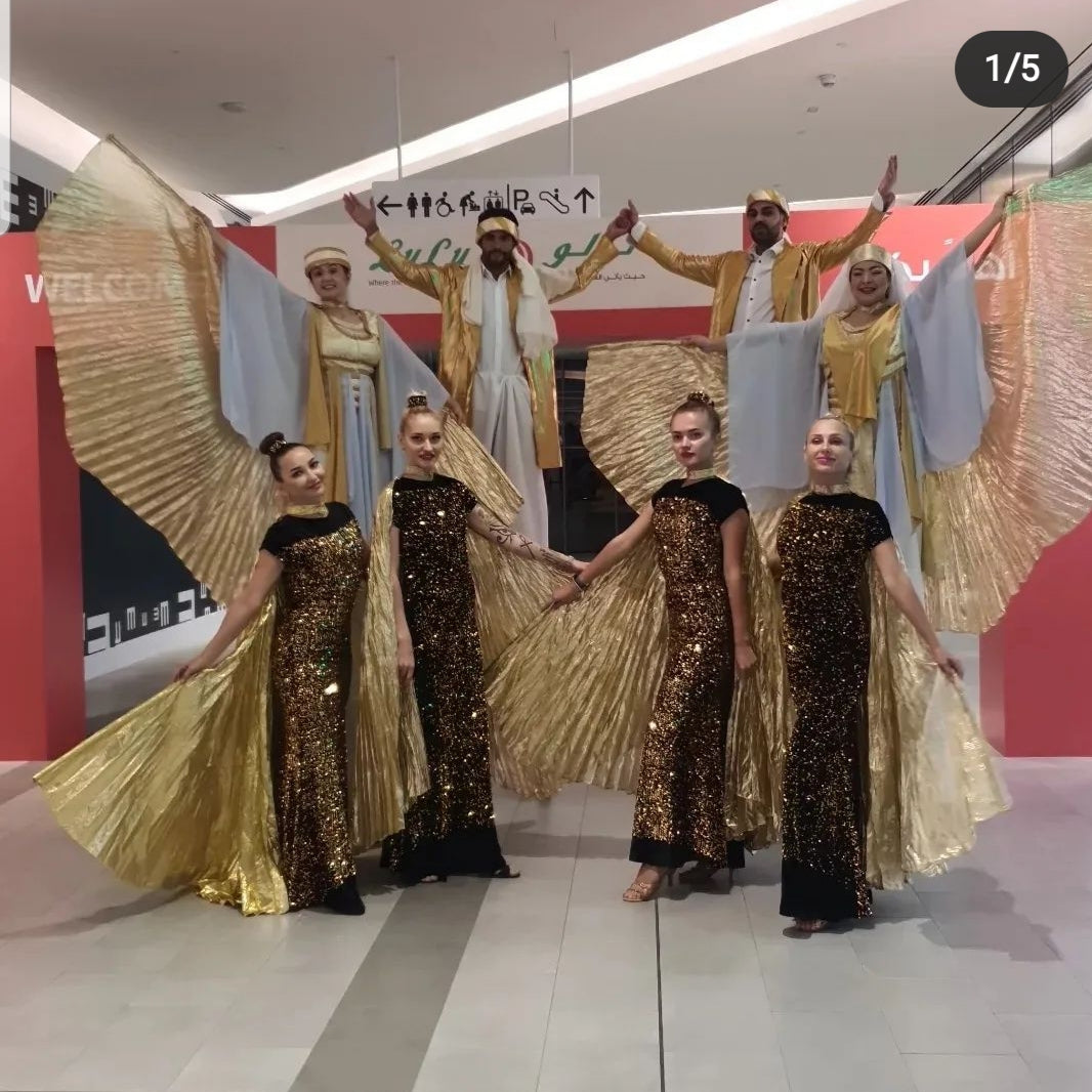 Golden Colour Stilt Walker and Wings dancers by Fidelio Arts