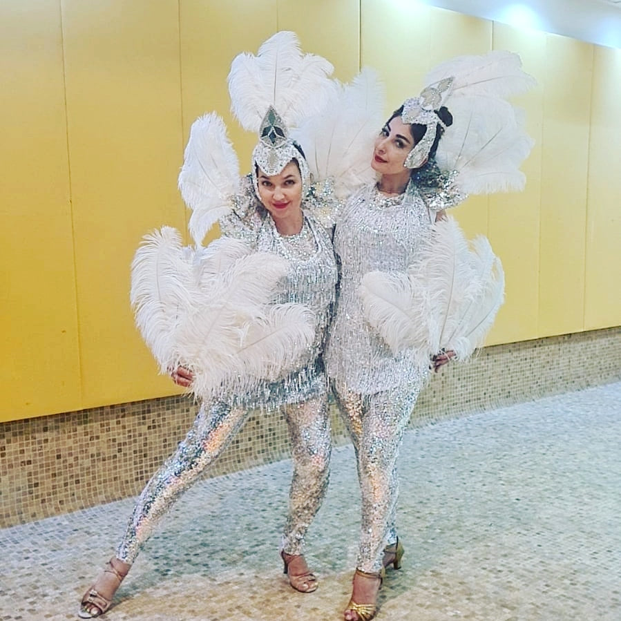 White Latino dancers and hostess by Fidelio Arts