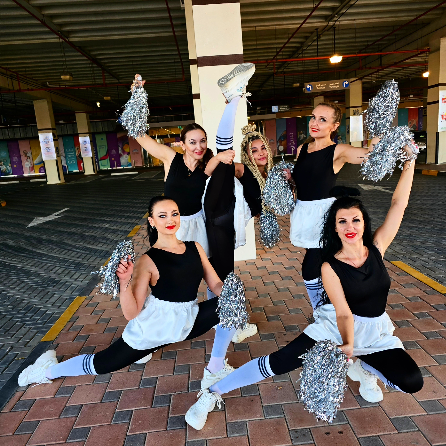 White and Black cheerleader dancers and hostess by Fidelio Arts