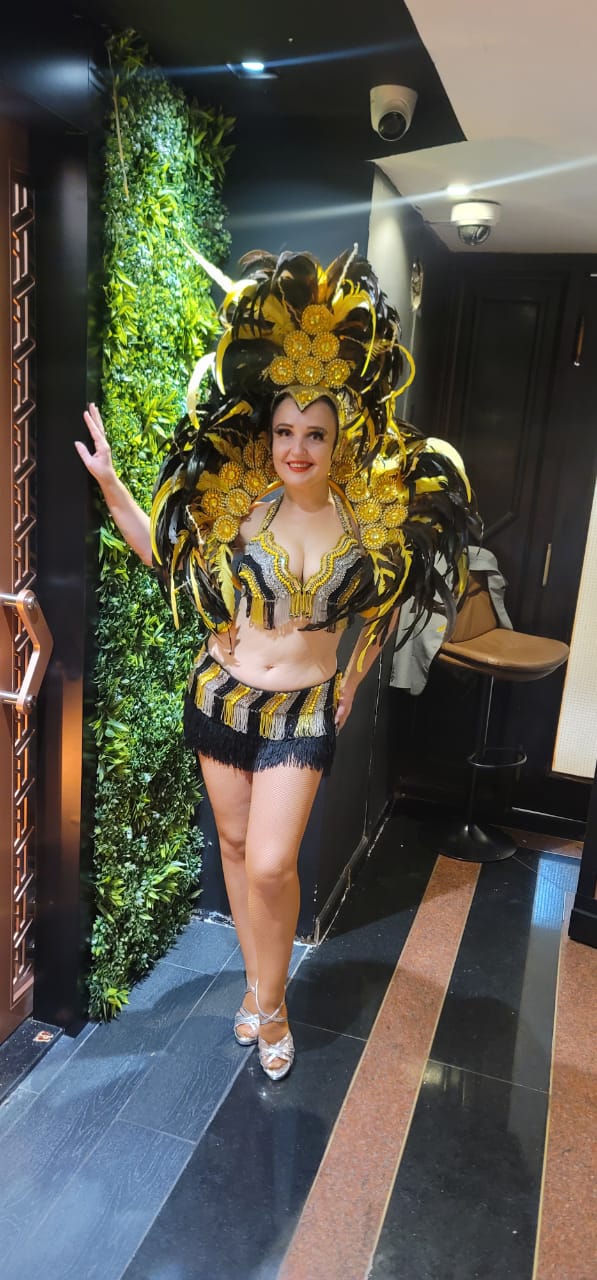 Black and Golden Brazilian hostess and dancers by Fidelio Arts