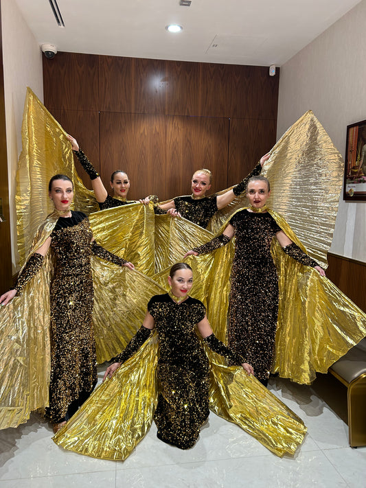 Black and Golden Wings dancers by Fidelio Arts