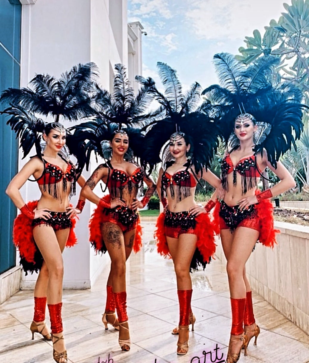 Black and Red Feather Dancers and Hostess by Fidelio Arts