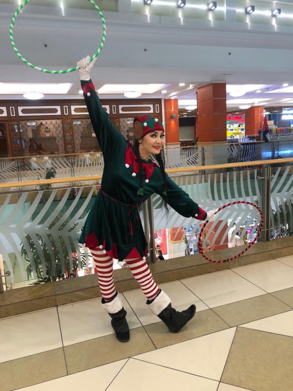 Christmas costumed hula hoop elf