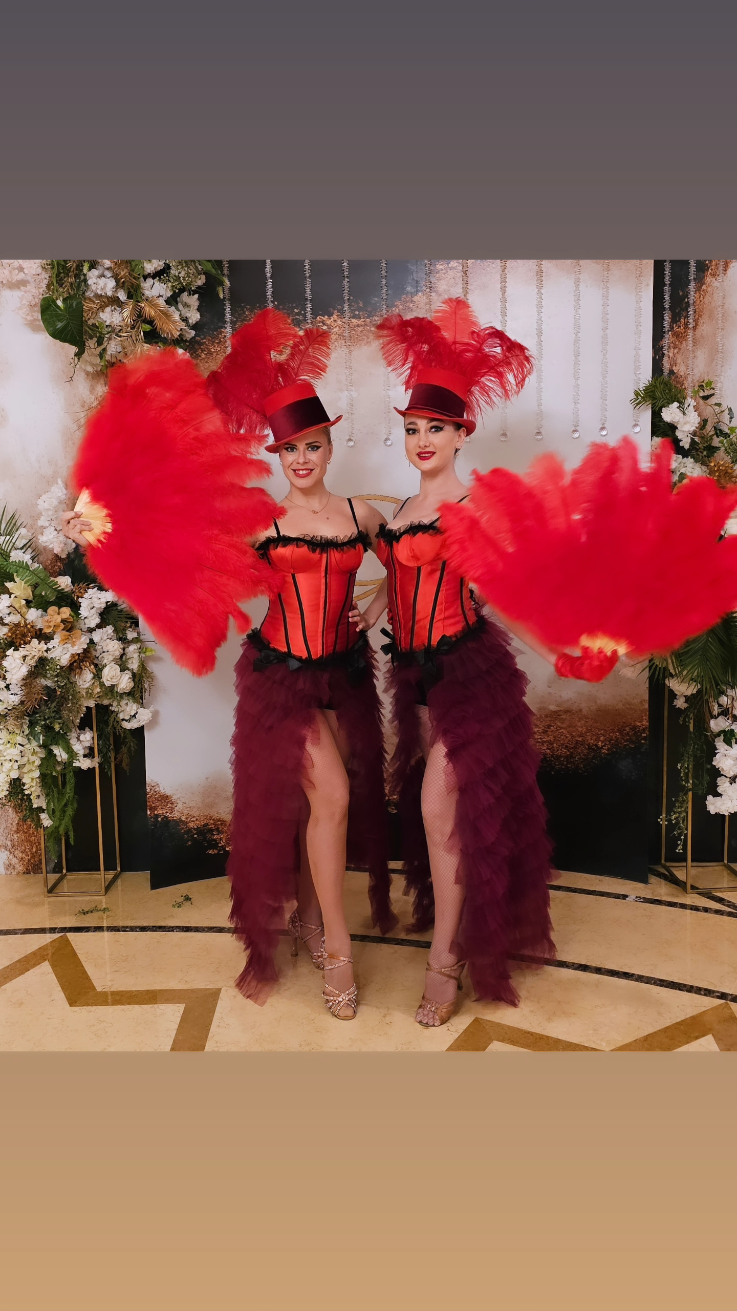 Feather cabaret dancers and hostess by Fidelio Arts
