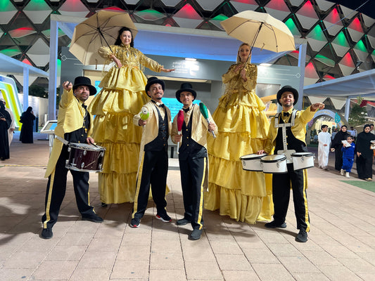Golden Umbrella Stilt Walker Carnival