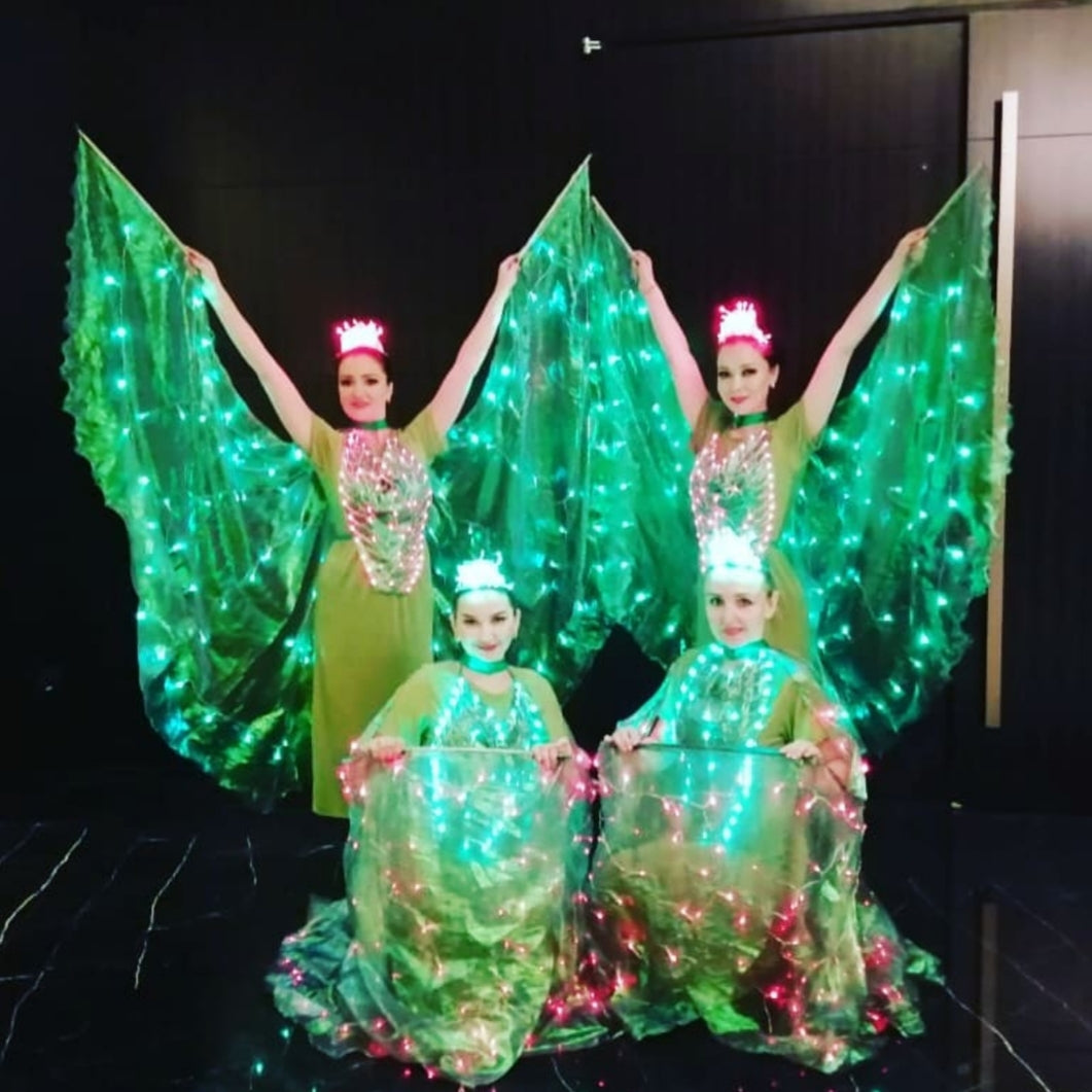 Green LED dancers by Fidelio Arts