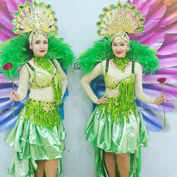 Green Feather Dancers and Hostess by Fidelio Arts