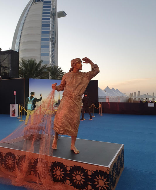 Human Statues Fisherman