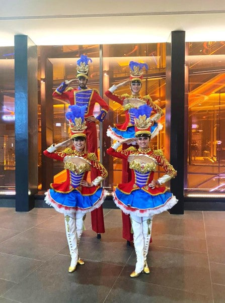 Royal Soldiers Parade with Stilt Walker
