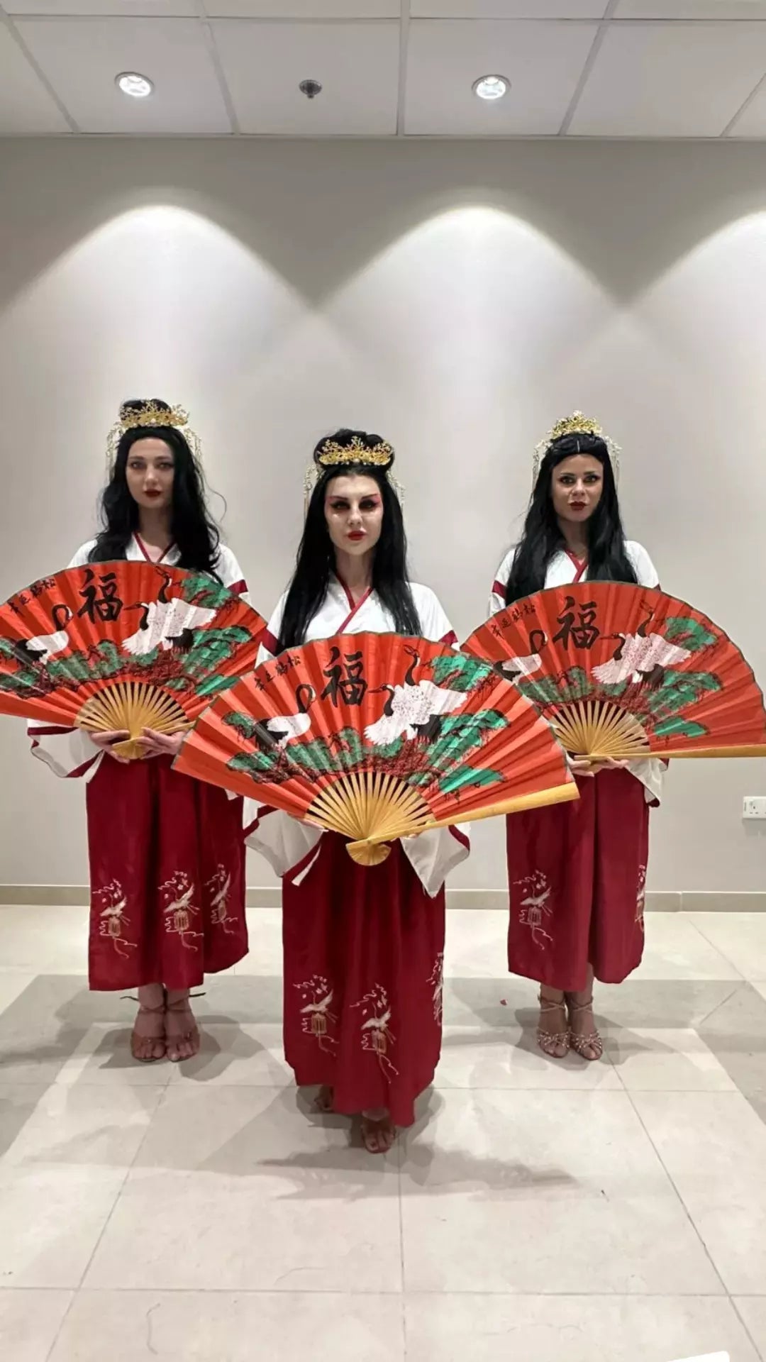 Red and White Feather Kimono dancers by Fidelio Arts