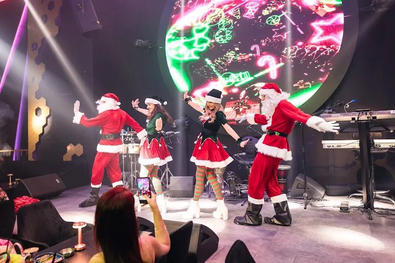 Santa Claus and Elf dancers by Li costa