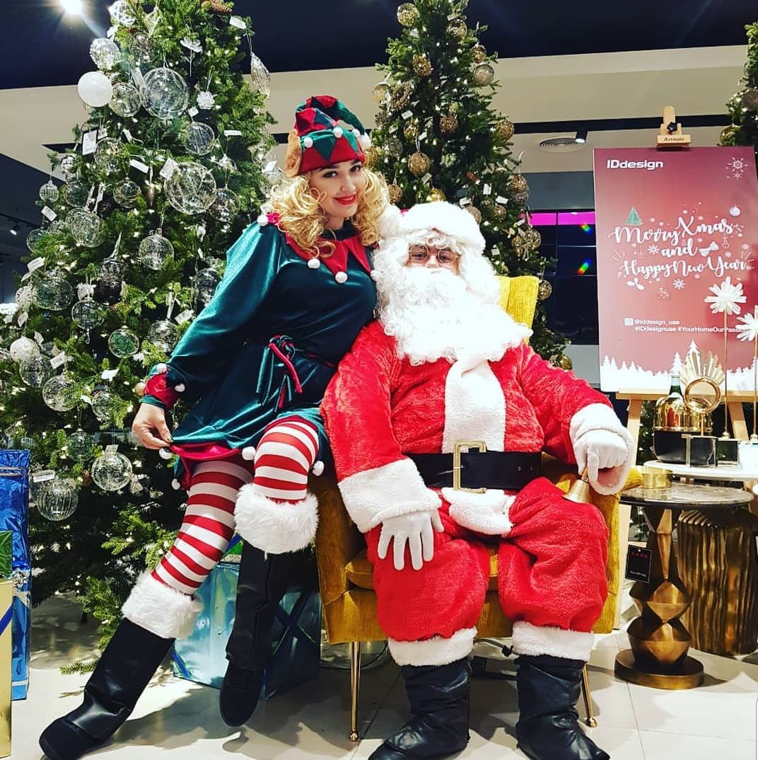 Santa and Elf by Li Costa