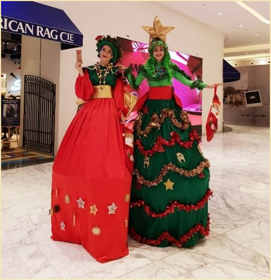 XMAS Tree and Red Female Santa Stilt Walker